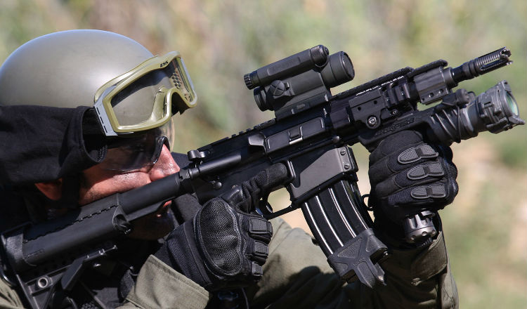 Aimpoint Comp M4 attached to an assault rifle